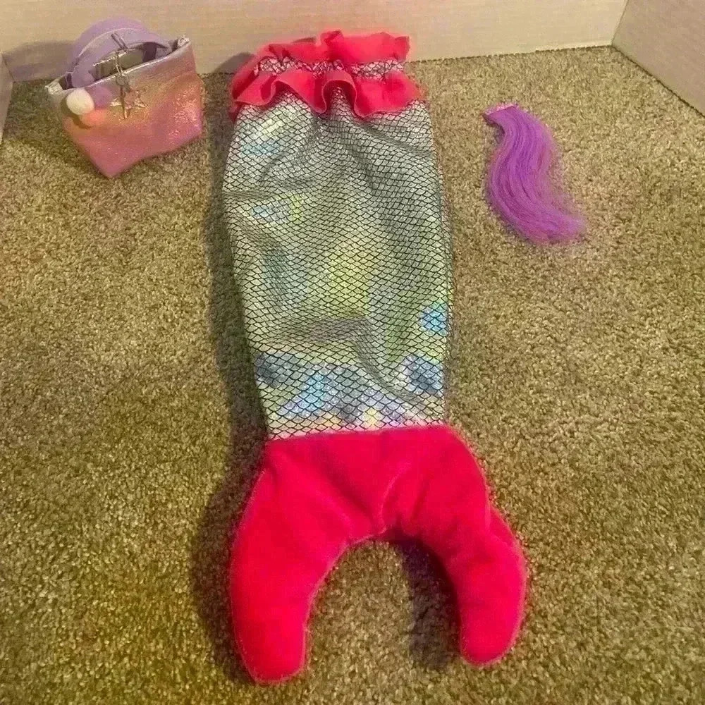 18” Doll Mermaid tale, bag‎ and purple hair clip.